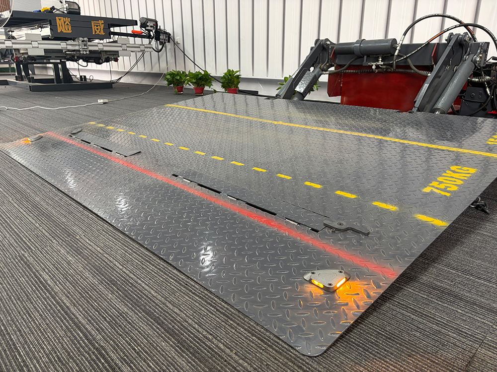 Q700 high-strength steel tail lift platform with durable anti-slip surface and safety markings
